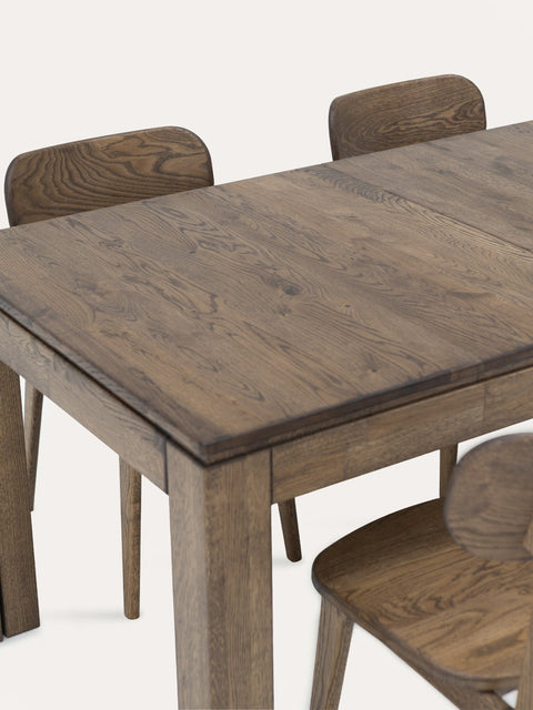 Table à manger à rallonges 160-310 cm avec 4 rallonges en chêne massif fumé Sorrento